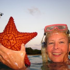 Caribbean Sailing Charters | Bridget with a starfish in BVI